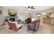 Inviting living room with a stone fireplace and views of the wet bar at 5401 E Corrine Dr, Scottsdale, AZ 85254