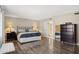 Spacious main bedroom featuring hard surface floors and ensuite bathroom at 5401 E Corrine Dr, Scottsdale, AZ 85254