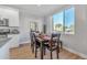 Dining room featuring a window with a view and modern decor at 5401 E Van Buren St # 1068, Phoenix, AZ 85008