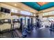 The community gym is equipped with treadmills and weight machines, offering a full workout at 5401 E Van Buren St # 2050, Phoenix, AZ 85008