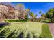 Well-maintained putting green on the property with the picnic area in the background, offering recreational opportunities at 5401 E Van Buren St # 2050, Phoenix, AZ 85008