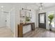 Welcoming entryway with a wooden console table and stylish decor at 5412 E Tierra Buena Ln, Scottsdale, AZ 85254