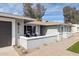 Attractive single-story home with a private front patio and drought-tolerant plants at 5412 E Tierra Buena Ln, Scottsdale, AZ 85254