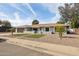 Charming single-story home with desert landscaping and a well-maintained front yard at 5412 E Tierra Buena Ln, Scottsdale, AZ 85254