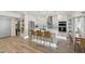 Modern kitchen with white cabinets, a large island, and stainless steel appliances at 5412 E Tierra Buena Ln, Scottsdale, AZ 85254