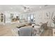 Spacious living room with an open layout, kitchen views, and access to the backyard at 5412 E Tierra Buena Ln, Scottsdale, AZ 85254