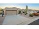 Spacious single Gathering home with wide driveway and desert landscaping at 5742 S Creosote Dr, Gold Canyon, AZ 85118