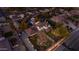 Aerial view of a luxury house with lush landscaping, including a swimming pool at 616 E Carver Rd, Tempe, AZ 85284