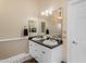 Bathroom featuring dual sinks and a spacious countertop at 616 E Carver Rd, Tempe, AZ 85284