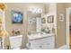 Cozy bathroom with white cabinets, granite countertops, and decorative wall art in neutral color palette at 616 E Carver Rd, Tempe, AZ 85284