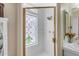 Elegant bathroom features a glass shower with decorative window and updated fixtures at 616 E Carver Rd, Tempe, AZ 85284