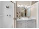 Bright bathroom with a dual sink vanity and a well-lit mirror at 616 E Carver Rd, Tempe, AZ 85284