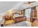 Elegant bedroom featuring a large window, ceiling fan, and a comfortable decorative bed at 616 E Carver Rd, Tempe, AZ 85284