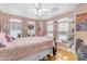 Comfortable bedroom featuring many windows and a cozy reading nook at 616 E Carver Rd, Tempe, AZ 85284