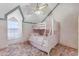 Bedroom with bunkbeds, light carpet, and a ceiling fan at 616 E Carver Rd, Tempe, AZ 85284