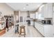 Bright kitchen with stainless appliances and granite countertops for meal preparation at 616 E Carver Rd, Tempe, AZ 85284