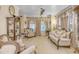 Cozy living room featuring ornate furniture, plush carpeting, and natural light from multiple windows at 616 E Carver Rd, Tempe, AZ 85284