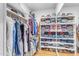 Well-organized walk-in closet with extensive shelving and storage solutions at 616 E Carver Rd, Tempe, AZ 85284