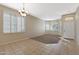 Open-concept dining area with tile flooring, lots of natural light, and access to the living areas at 6516 W Matilda Ln, Glendale, AZ 85308