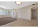 Bright and airy dining area with ample natural light from the large windows and tile flooring at 6516 W Matilda Ln, Glendale, AZ 85308