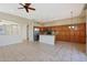 Modern kitchen with stainless steel appliances, an island, and abundant cabinet space at 6516 W Matilda Ln, Glendale, AZ 85308