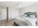 Bright and airy bedroom with modern decor, a comfortable bed, and ample closet space at 7318 W Paso Trl, Peoria, AZ 85383