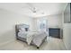 Relaxing bedroom featuring modern decor, a comfortable bed, and plenty of natural light at 7318 W Paso Trl, Peoria, AZ 85383