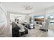 Bright living room with a view to the kitchen and outdoor patio at 7318 W Paso Trl, Peoria, AZ 85383