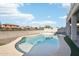 Private pool surrounded by landscaping, perfect for enjoying sunny days and outdoor fun at 7318 W Paso Trl, Peoria, AZ 85383