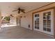 Relaxing covered back patio with ceiling fans providing comfort for outdoor enjoyment at 7539 N 50Th Ave, Glendale, AZ 85301