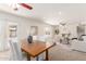 Bright living and dining area with white walls, wood accents, and comfortable seating at 7539 N 50Th Ave, Glendale, AZ 85301