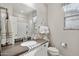 Well-lit bathroom featuring modern fixtures and a neutral color palette at 7924 S 24Th Pl, Phoenix, AZ 85042