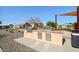 Outdoor BBQ grill and dining area within the neighborhood offer a great space to enjoy outdoor living at 7924 S 24Th Pl, Phoenix, AZ 85042