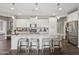 Kitchen with a large center island, granite counters, and barstool seating at 7924 S 24Th Pl, Phoenix, AZ 85042