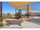 Community playground with a slide, climbing structures and bench seating for parents at 7924 S 24Th Pl, Phoenix, AZ 85042