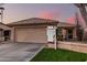 Single-story home boasting desert landscaping, well-kept lawn, and a for sale sign in the front yard at 80 S Maple Ct, Chandler, AZ 85226