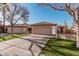 Single-story home boasting desert landscaping, well-kept lawn, and a for sale sign in the front yard at 80 S Maple Ct, Chandler, AZ 85226