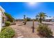 Backyard featuring desert landscaping with pavers and native plants at 8233 E Calypso Ave, Mesa, AZ 85208