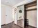 This bedroom features a mirrored closet, hardwood floors, and a crisp white interior at 8258 E Calypso Ave, Mesa, AZ 85208