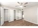 Spacious bedroom features vinyl wood floors, large closets, and ample natural light at 836 S Pasadena St, Mesa, AZ 85210