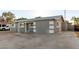 Charming single-story home with a gray exterior, covered entry, and low-maintenance landscaping at 836 S Pasadena St, Mesa, AZ 85210