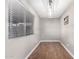 Dining Room featuring wood floors, and a large window with blinds at 9134 E Gary Ln, Mesa, AZ 85207