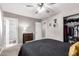 Spacious bedroom showcasing ample closet space, neutral decor, and a relaxing atmosphere at 9134 E Gary Ln, Mesa, AZ 85207