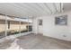 Enclosed patio with concrete floor, window, and entrance door at 10105 W Bolivar Dr, Sun City, AZ 85351