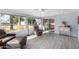 Relaxing sunroom with tile flooring, lots of natural light, and comfortable seating at 10105 W Bolivar Dr, Sun City, AZ 85351