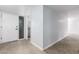 Bright entryway showcases tile flooring, clean lines, and easy access to other rooms at 10808 W Kelso Dr, Sun City, AZ 85351