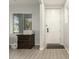 Bright entryway with a white door, wood-look tile flooring, and a chest of drawers at 1149 E Sourwood Dr, Gilbert, AZ 85298