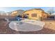 Pool and patio featuring desert landscaping, a fire pit area, and privacy fence at 1149 E Sourwood Dr, Gilbert, AZ 85298