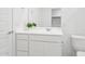 Clean bathroom with a sleek vanity, modern fixtures, and a well-lit mirror at 12089 E Sunflower Ln, Florence, AZ 85132