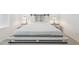 Bedroom setup showcasing a comfortable mattress, side tables with lamps, and ample space at 12089 E Sunflower Ln, Florence, AZ 85132